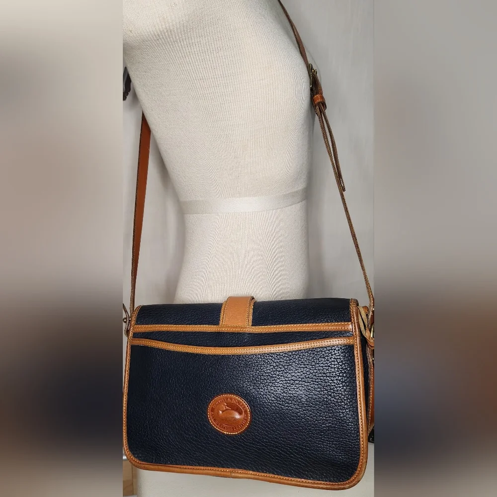 Dooney & Bourke vintage equestrian all weather leather crossbody bag, navy